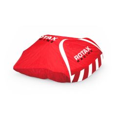 Image of the cover over an object, red with white accents and “ROTAX RACING” logo